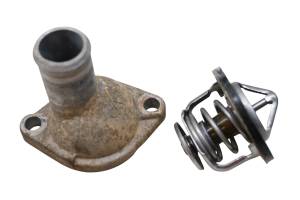 John Deere - 13 John Deere Gator XUV 825i Thermostat & Cover - Image 1